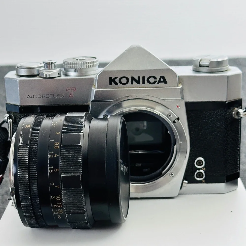 Konica Autoreflex T 35mm SLR Film Camera with Soligor Lens Silver Black UNTESTED